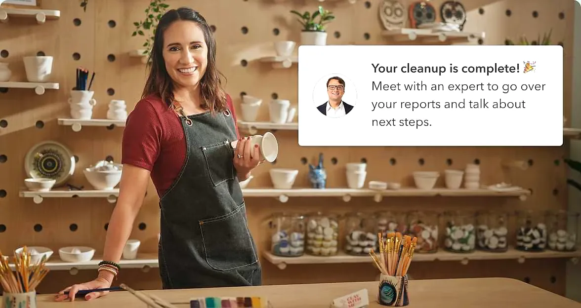 Business owner reviewing bookkeeping cleanup progress with QuickBooks ProAdvisor